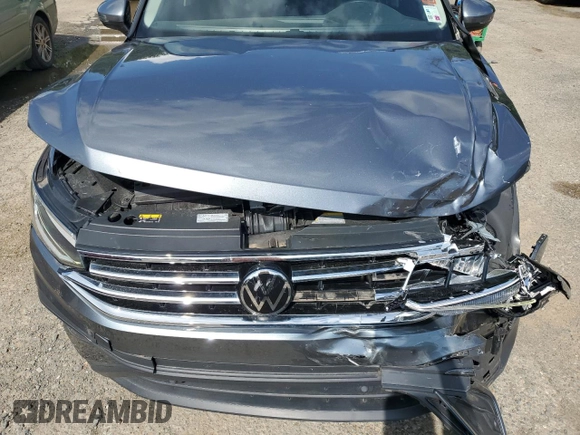 2022 Volkswagen Tiguan SE с VIN 3VV3B7AX1NM101288, выставлен на аукционе Copart как лот 54882085 с пробегом 16 095 миль миль и Списание • Salvage title. История ставок и продаж доступна на DreamBid. Изображение 12.
