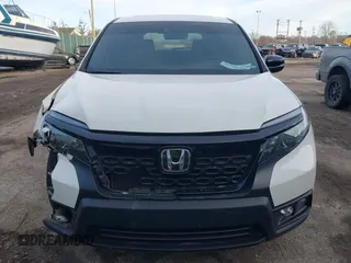 2019 Honda Passport EX-L with VIN 5FNYF8H5XKB008904, listed as a IAAI auction lot 41440706 with 57,317 mi miles and . Bid and sale history available at DreamBid. Image 12.