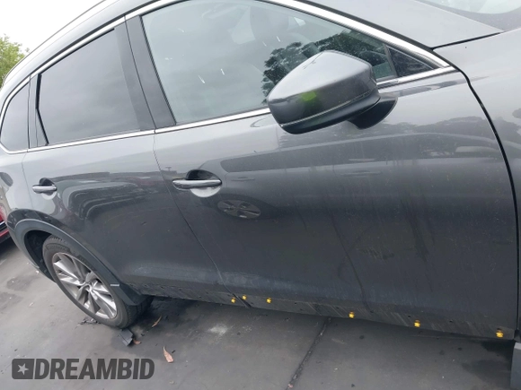 2018 Mazda CX-9 Grand Touring with VIN JM3TCBDY1J0200183, listed as a IAAI auction lot 42408132 with 69,023 mi miles and . Bid and sale history available at DreamBid. Image 14.
