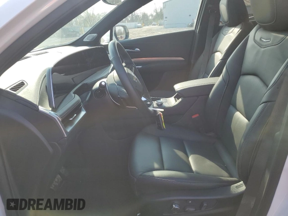 2024 Cadillac XT4 AWD Premium Luxury with VIN 1GYFZDR40RF225603, listed as a Copart auction lot 87899975 with 1,659 mi miles and Salvage title. Bid and sale history available at DreamBid. Image 7.