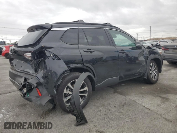2024 Toyota Corolla Cross XLE with VIN 7MUDAAAG8RV095021, listed as a Copart auction lot 59232265 with 7,010 mi miles and Salvage title. Bid and sale history available at DreamBid. Image 3.