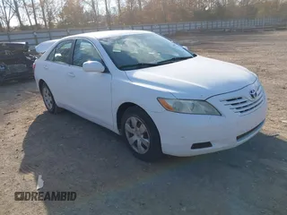 2009 Toyota Camry LE z VIN 4T1BK46K79U579024, wystawiony jako IAAI lot #41004813 z przebiegiem 154 621 mil mil oraz . Historia ofert i sprzedaży dostępna na DreamBid. Obrazek 1.