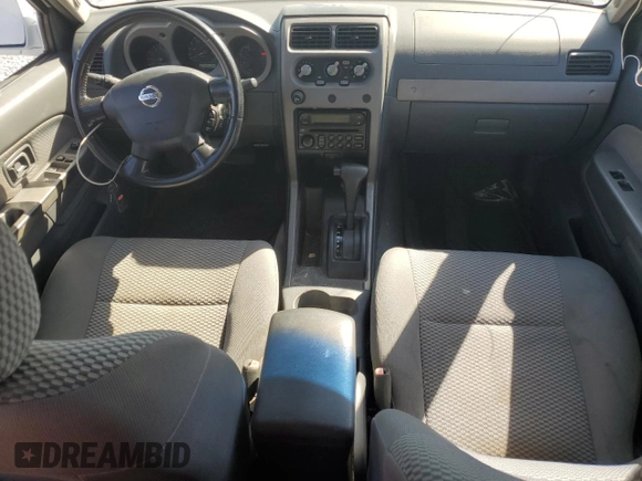 2002 Nissan Frontier SE z VIN 1N6ED27T42C319065, wystawiony jako Copart lot #74206474 z przebiegiem 147 724 mil mil oraz Szkoda całkowita • Salvage title. Historia ofert i sprzedaży dostępna na DreamBid. Obrazek 8.