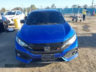 2018 Honda Civic Si with VIN 2HGFC1E56JH700325, listed as a IAAI auction lot 42007770 with 101,386 mi miles and . Bid and sale history available at DreamBid. Image 12.