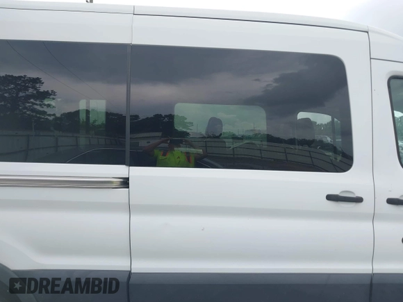2017 Ford Transit XL with VIN 1FBAX2CM0HKA76042, listed as a IAAI auction lot 42475759 with 92,451 mi miles and . Bid and sale history available at DreamBid. Image 14.