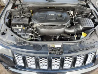 2017 Jeep Grand Cherokee Altitude z VIN 1C4RJFAG4HC714596, wystawiony jako Copart lot #51675295 z przebiegiem 138 928 mil mil oraz Szkoda całkowita • Salvage title. Historia ofert i sprzedaży dostępna na DreamBid. Obrazek 11.