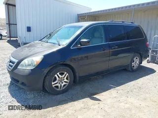 2005 Honda Odyssey EX-L z VIN 5FNRL38645B096460, wystawiony jako IAAI lot #42347856 z przebiegiem 230 329 mil mil oraz . Historia ofert i sprzedaży dostępna na DreamBid. Obrazek 2.