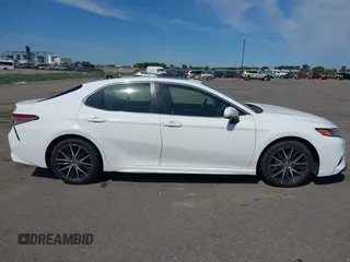 2018 Toyota Camry LE z VIN JTNB11HK2J3048094, wystawiony jako IAAI lot #42331953 z przebiegiem 239 000 mil mil oraz . Historia ofert i sprzedaży dostępna na DreamBid. Obrazek 12.
