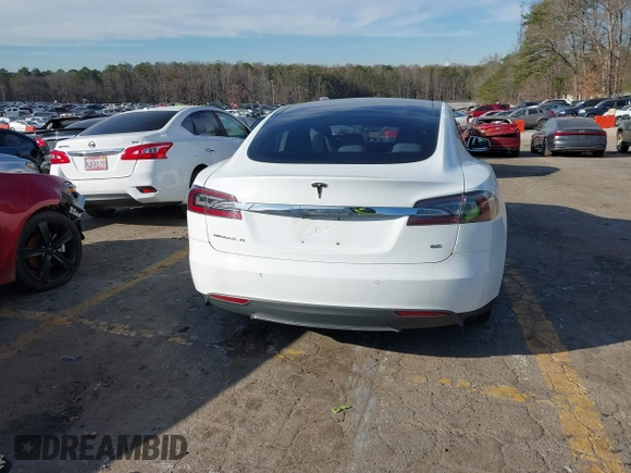 2014 Tesla Model S 60 with VIN 5YJSA1H13EFP62451, listed as a IAAI auction lot 41639068 with 88,000 mi miles and . Bid and sale history available at DreamBid. Image 16.