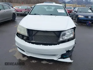 2011 Dodge Avenger Express with VIN 1B3BD4FB0BN556233, listed as a IAAI auction lot 41794938 with 104,085 mi miles and . Bid and sale history available at DreamBid. Image 12.