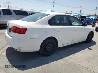 2014 Volkswagen Jetta S with VIN 3VW2K7AJ2EM356471, listed as a Copart auction lot 60475395 with 147,201 mi miles and Clean title. Bid and sale history available at DreamBid. Image 3.