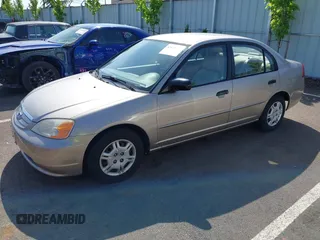 2001 Honda Civic LX with VIN 2HGES16541H509564, listed as a IAAI auction lot 42121423 with 129,561 mi miles. Bid and sale history available at carsss.com. Image 2.