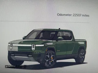 2022 Rivian R1T Adventure z VIN 7FCTGAAA8NN015369, wystawiony jako IAAI lot #41407842 z przebiegiem 22 507 mil mil oraz . Historia ofert i sprzedaży dostępna na DreamBid. Obrazek 15.