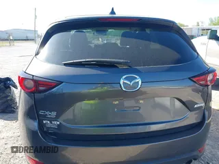 2018 Mazda CX-5 Grand Touring with VIN JM3KFBDM7J0454836, listed as a IAAI auction lot 42001397 with 146,879 mi miles. Bid and sale history available at carsss.com. Image 16.