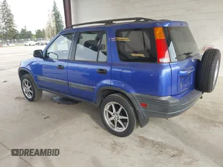 2001 Honda CR-V LX with VIN JHLRD28451C005857, listed as a IAAI auction lot 42004556 with 211,403 mi miles. Bid and sale history available at carsss.com. Image 3.