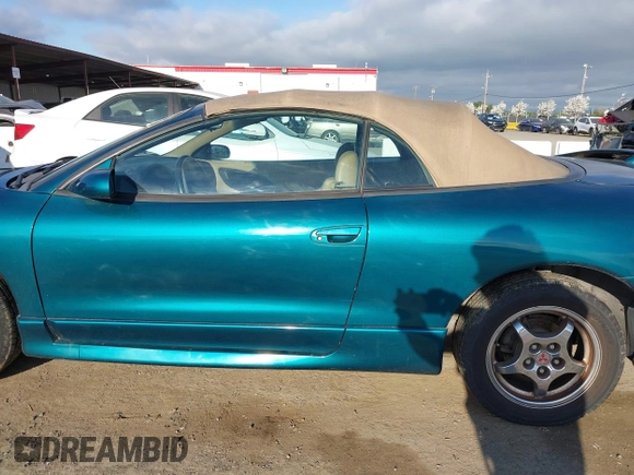 1999 Mitsubishi Eclipse GS-T with VIN 4A3AX55F6XE052978, listed as a IAAI auction lot 41841812 with 92,776 mi miles and . Bid and sale history available at carsss.com. Image 14.