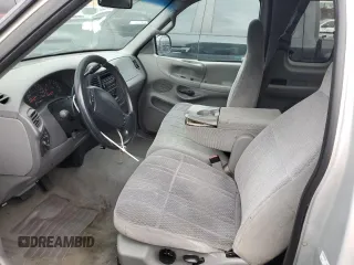 1998 Ford F-150 XL with VIN 1FTRX17L3WKB36791, listed as a Copart auction lot 42141915 with 201,067 mi miles and Salvage title. Bid and sale history available at DreamBid. Image 7.