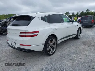 2023 Genesis GV80 z VIN KMUHCESC7PU109750, wystawiony jako IAAI lot #41950393 z przebiegiem 27 229 mil mil oraz . Historia ofert i sprzedaży dostępna na DreamBid. Obrazek 4.