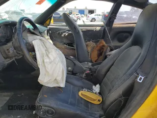 1999 Porsche 911 z VIN WP0AA2998XS620298, wystawiony jako Copart lot #59540745 z przebiegiem Nie podano mil oraz Szkoda całkowita • Salvage title. Historia ofert i sprzedaży dostępna na DreamBid. Obrazek 7.