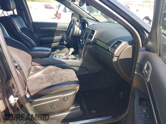 2017 Jeep Grand Cherokee Trailhawk with VIN 1C4RJFLG4HC940652, listed as a IAAI auction lot 42135489 with 102,593 mi miles and . Bid and sale history available at DreamBid. Image 5.