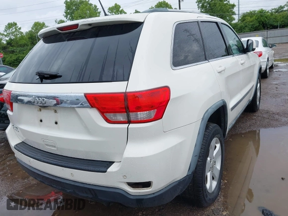 2011 Jeep Grand Cherokee Laredo z VIN 1J4RR4GG1BC572827, wystawiony jako IAAI lot #42313674 z przebiegiem 273 215 mil mil oraz . Historia ofert i sprzedaży dostępna na DreamBid. Obrazek 4.