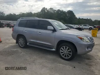 2011 Lexus LX 570 with VIN JTJHY7AX6B4061104, listed as a Copart auction lot 57788225 with 184,040 mi miles and Clean title. Bid and sale history available at DreamBid. Image 4.