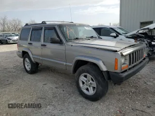 2001 Jeep Cherokee Sport z VIN 1J4FF58SX1L576572, wystawiony jako Copart lot #48982965 z przebiegiem 174 500 mil mil oraz Szkoda całkowita • Salvage title. Historia ofert i sprzedaży dostępna na DreamBid. Obrazek 4.