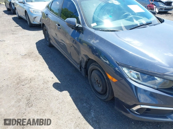2020 Honda Civic LX z VIN 2HGFC2F61LH567246, wystawiony jako IAAI lot #42290361 z przebiegiem 50 388 mil mil oraz . Historia ofert i sprzedaży dostępna na DreamBid. Obrazek 19.