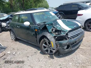 2009 MINI Hardtop with VIN WMWMF33549TU71313, listed as a IAAI auction lot 42483891 with 122,577 mi miles and . Bid and sale history available at DreamBid. Image 1.