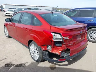 2018 Ford Focus SE with VIN 1FADP3FE2JL269804, listed as a IAAI auction lot 41708103 with 68,623 mi miles. Bid and sale history available at carsss.com. Image 3.