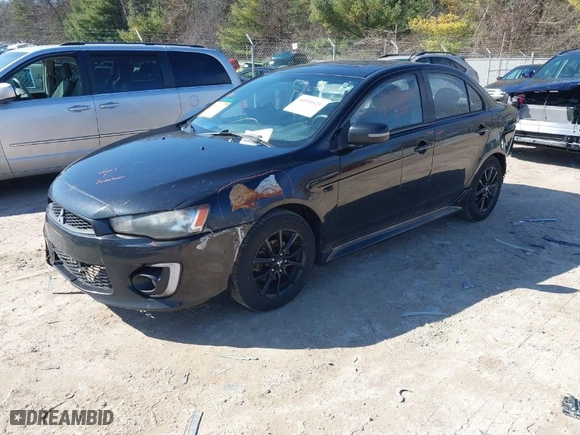 2017 Mitsubishi Lancer ES with VIN JA32U2FU4HU015140, listed as a IAAI auction lot 41890521 with 267,436 mi miles. Bid and sale history available at carsss.com. Image 2.