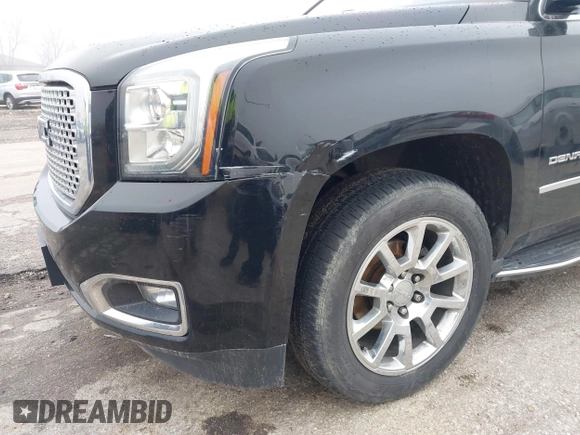 2017 GMC Yukon XL Denali with VIN 1GKS2HKJ2HR310377, listed as a IAAI auction lot 41153582 with 130,194 mi miles. Bid and sale history available at carsss.com. Image 22.