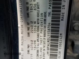 2022 Mazda Mazda3 Hatchback with VIN JM1BPALM2L1158704, listed as a Copart auction lot 75739504 with 79,588 mi miles and Salvage Title. Bid and sale history available at carsss.com. Image 12.