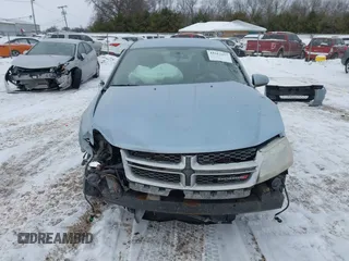 2013 Dodge Avenger SXT with VIN 1C3CDZCB9DN637114, listed as a IAAI auction lot 41613457 with 138,766 mi miles and . Bid and sale history available at carsss.com. Image 12.