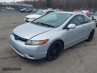 2007 Honda Civic Cpe LX with VIN 2HGFG12657H537497, listed as a IAAI auction lot 41993147 with 233,217 mi miles. Bid and sale history available at carsss.com. Image 2.