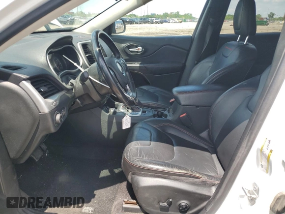 2015 Jeep Cherokee Trailhawk with VIN 1C4PJMBSXFW651000, listed as a Copart auction lot 64110515 with 135,571 mi miles and Clean title. Bid and sale history available at DreamBid. Image 7.