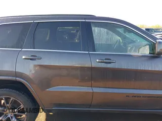 2015 Jeep Grand Cherokee Laredo with VIN 1C4RJFAGXFC631123, listed as a IAAI auction lot 41859251 with 201,558 mi miles. Bid and sale history available at carsss.com. Image 13.