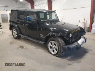 2015 Jeep Wrangler Unlimited Sahara with VIN 1C4BJWEG5FL611521, listed as a Copart auction lot 50609985 with 207,473 mi miles and Salvage Title. Bid and sale history available at carsss.com. Image 4.