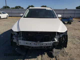 2018 Mazda CX-5 Touring z VIN JM3KFACM7J0370737, wystawiony jako Copart lot #60113725 z przebiegiem 131 385 mil mil oraz Szkoda całkowita • Salvage title. Historia ofert i sprzedaży dostępna na DreamBid. Obrazek 5.