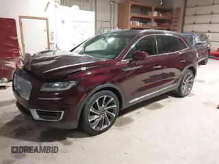 2019 Lincoln Nautilus Reserve z VIN 2LMPJ8L92KBL42653, wystawiony jako IAAI lot #41887906 z przebiegiem 52 450 mil mil oraz . Historia ofert i sprzedaży dostępna na DreamBid. Obrazek 17.
