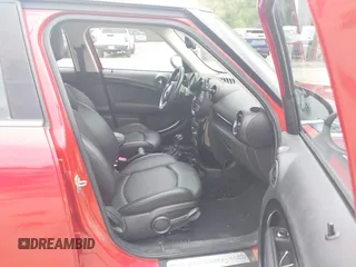 2014 MINI Countryman S z VIN WMWZC5C50EWP39566, wystawiony jako IAAI lot #42456424 z przebiegiem 99 518 mil mil oraz . Historia ofert i sprzedaży dostępna na DreamBid. Obrazek 5.