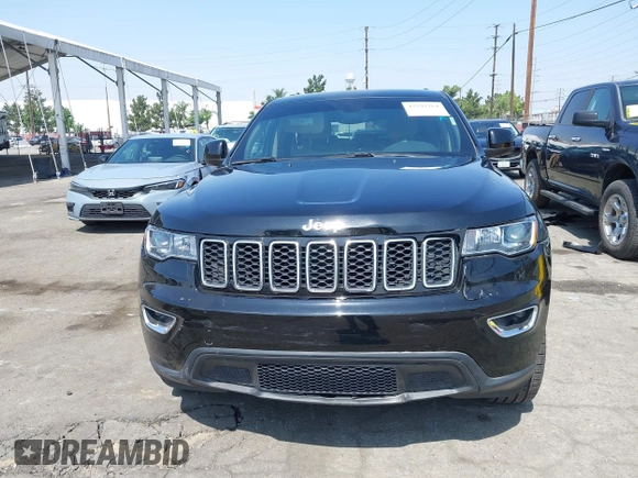 2022 Jeep Grand Cherokee Laredo X with VIN 1C4RJEAG7NC171377, listed as a IAAI auction lot 42592264 with 69,074 mi miles and . Bid and sale history available at DreamBid. Image 12.