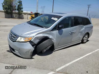 2012 Honda Odyssey Touring с VIN 5FNRL5H90CB022861, выставлен на аукционе Copart как лот 58383235 с пробегом 193 937 миль миль и Списание • Salvage title. История ставок и продаж доступна на DreamBid. Изображение 1.