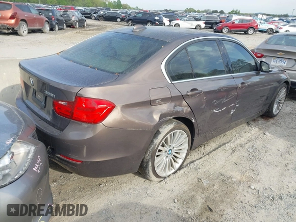 2012 BMW 3 Series 328i with VIN WBA3A5C5XCF349888, listed as a IAAI auction lot 41954810 with 163,070 mi miles. Bid and sale history available at carsss.com. Image 4.