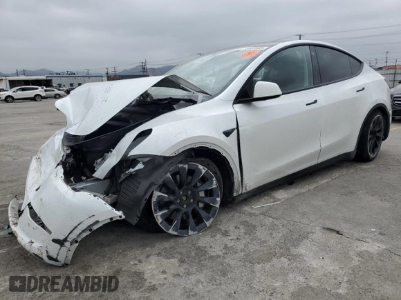 2023 Tesla Model Y Long Range z VIN 7SAYGDEE9PA070232, wystawiony jako Copart lot #55881805 z przebiegiem 38 276 mil mil oraz Szkoda całkowita • Salvage title. Historia ofert i sprzedaży dostępna na DreamBid. Obrazek 1.