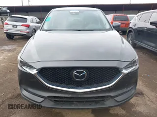 2017 Mazda CX-5 Grand Touring with VIN JM3KFBDL3H0143194, listed as a IAAI auction lot 42049258 with 74,159 mi miles. Bid and sale history available at carsss.com. Image 12.