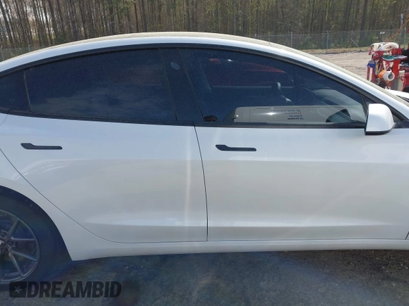 2022 Tesla Model 3 with VIN 5YJ3E1EA5NF124148, listed as a IAAI auction lot 41908884 with 45,115 mi miles. Bid and sale history available at carsss.com. Image 14.