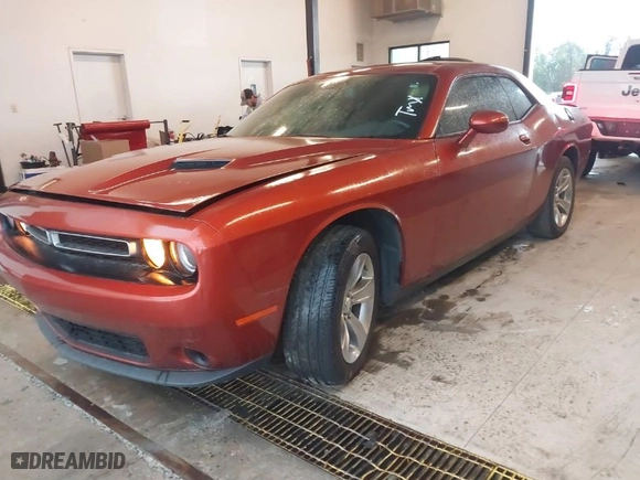 2020 Dodge Challenger SXT with VIN 2C3CDZAG6LH181644, listed as a IAAI auction lot 41857479 with 84,397 mi miles. Bid and sale history available at carsss.com. Image 2.