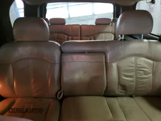 2001 Chevrolet Tahoe LT z VIN 1GNEK13T11R105615, wystawiony jako Copart lot #54928215 z przebiegiem 183 623 mil mil oraz Szkoda całkowita • Salvage title. Historia ofert i sprzedaży dostępna na DreamBid. Obrazek 10.