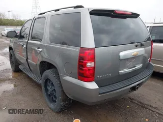 2007 Chevrolet Tahoe LT with VIN 1GNFC13077J278764, listed as a IAAI auction lot 41927809 with 211,943 mi miles and . Bid and sale history available at DreamBid. Image 3.